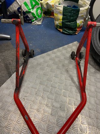 Caballete moto rojo
