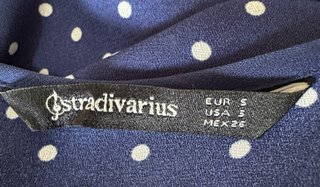 Blusa azul con lunares blancos nueva