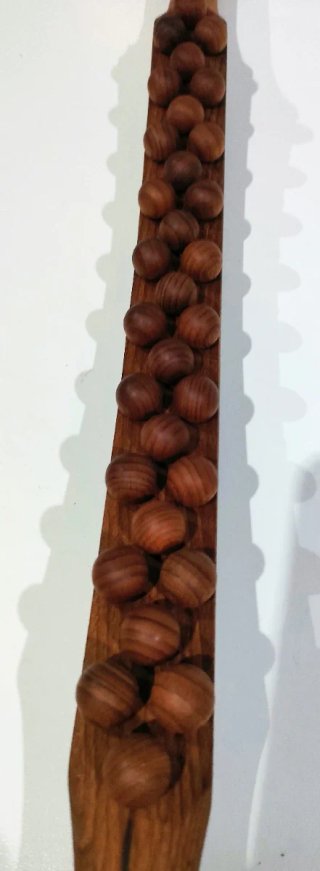 Rodillo de madera con cuentas