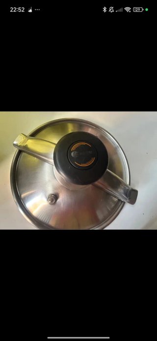 Olla a presión metálica