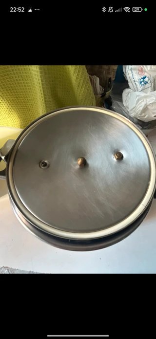 Olla a presión metálica