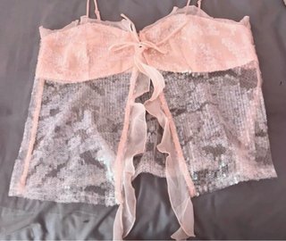 Top lentejuelas rosa con lazo