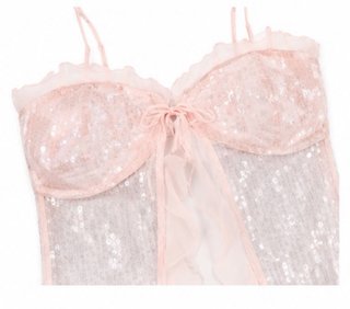 Top lentejuelas rosa con lazo