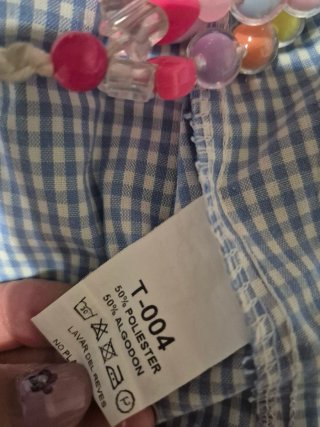 Bata escolar y pantalón corto  talla 4