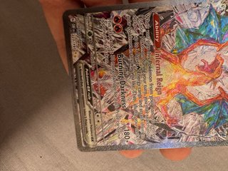 Carta Pokémon Charizard EX 223/197