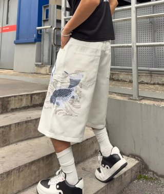 Pantalón corto blanco bordado
