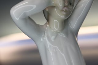 Porcelana Lladró. Niña con vela + Niño Despertando.
