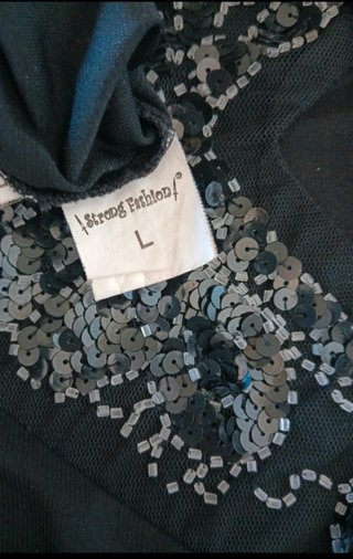 Blusa nera con strass
