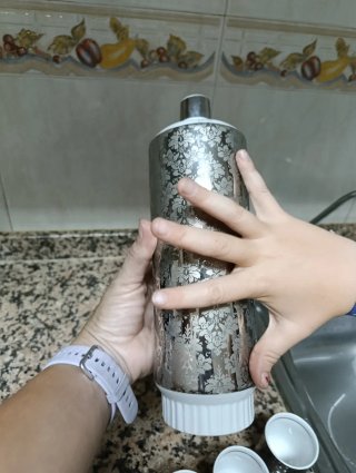Botella y 6 vasos de licor plateados