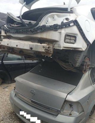 Opel 310786 guarnecido puerta tras der insignia