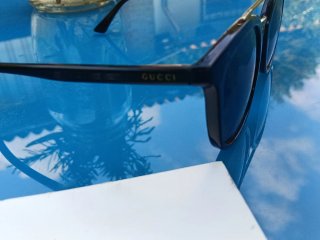 Occhiali da sole Gucci neri e oro