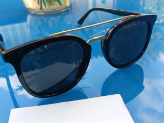 Occhiali da sole Gucci neri e oro