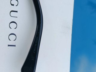 Occhiali da sole Gucci neri e oro