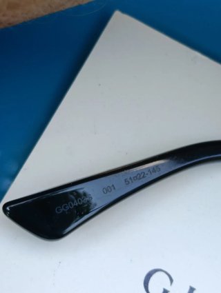 Occhiali da sole Gucci neri e oro