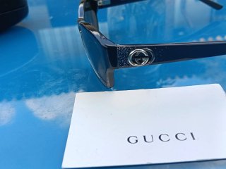 Occhiali da sole Gucci neri e marroni