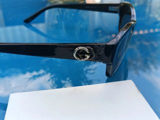 Occhiali da sole Gucci neri e marroni