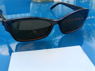 Occhiali da sole Gucci neri e marroni