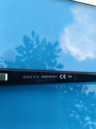 Occhiali da sole Gucci neri e marroni