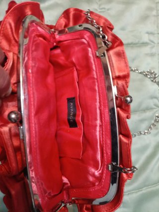 Bolso de fiesta naranja con flores