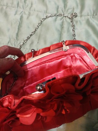 Bolso de fiesta naranja con flores