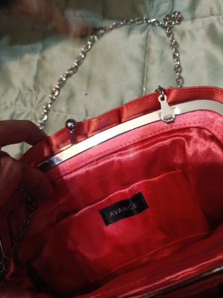 Bolso de fiesta naranja con flores