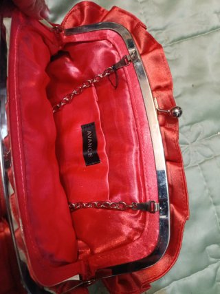 Bolso de fiesta naranja con flores