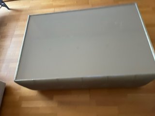 Mesa de centro cristal y piel beige