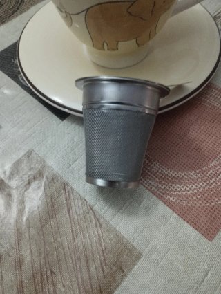 Tetera con plato y filtro