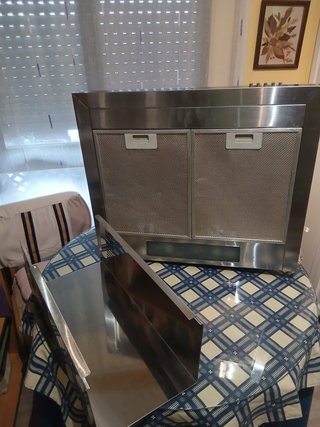 Campana extractora y monomando ducha