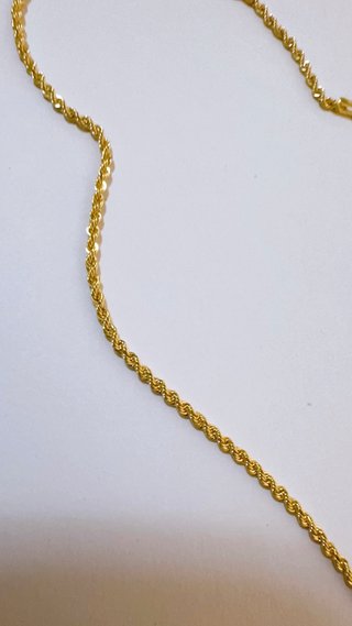Collana con crocifisso in oro bicolore 18kt 750