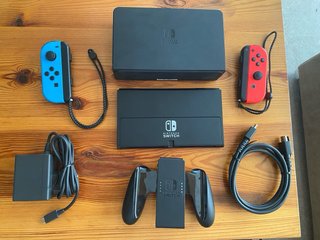 Nintendo Switch OLED Blu/Rosso + FIFA22