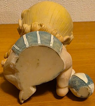 Soprammobile bimbo con orsetto e biberon