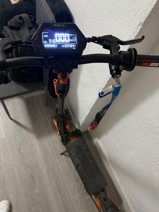 Patinete Eléctrico Naranja y Negro