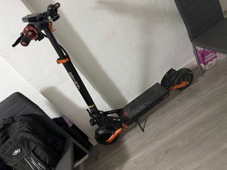 Patinete Eléctrico Naranja y Negro