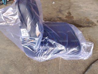 Asiento con suspensión mecánica