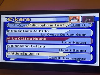 e-kara Auténtico Karaoke con 3 Canciones