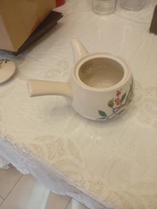 Tetera japonesa y 6 tazas de porcelana