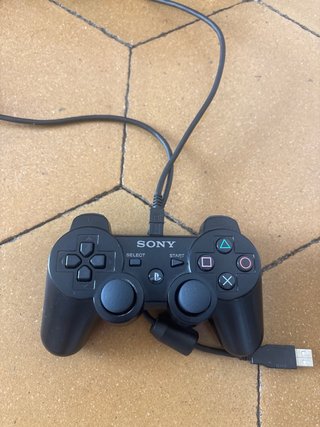 PS3 Sony Negra + 2 Mandos y 4 Juegos