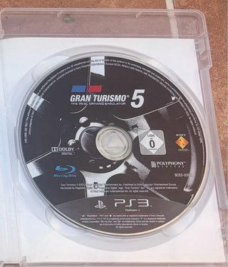 PS3 Sony Negra + 2 Mandos y 4 Juegos