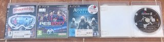 PS3 Sony Negra + 2 Mandos y 4 Juegos