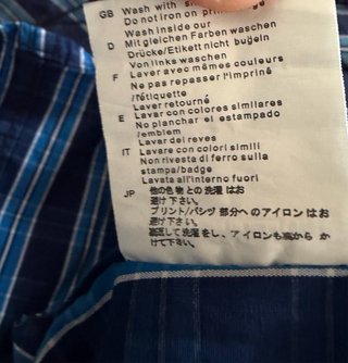 Camisa con capucha de chico a rayas manga larga