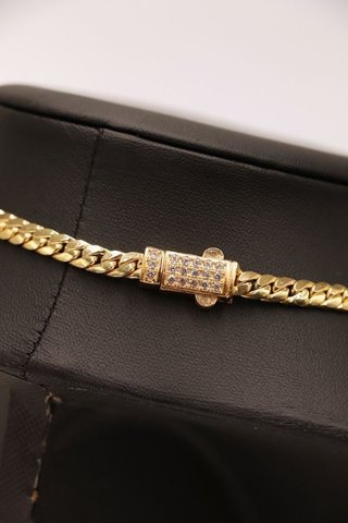 CADENA CUBANA MEDUSA CIERRE CIRCONITAS. Oro 18k.