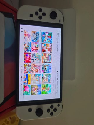 Nintendo Switch OLED+Caja+Accesorios+juegos