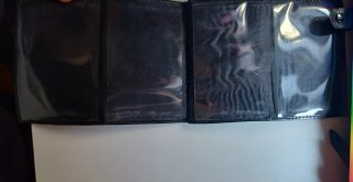 Cartera de piel negra con broche - estilo clásico