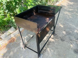 Barbacoa de hierro con encimera de granito