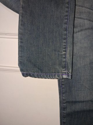 Jeans blu con dettagli viola