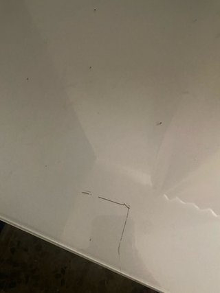 Tocador blanco con superficie de cristal