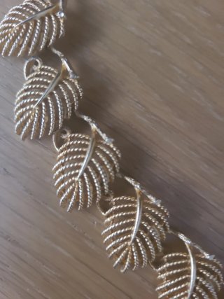 Conjunto Lisner: Collar, Pulsera y Pendientes Clip