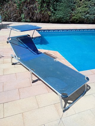 Tumbona plegable con parasol