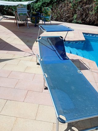 Tumbona plegable con parasol